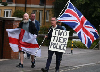 British Police Unit Flags Over 100 Social Media Posts For Arrest Amid Immigration Backlash