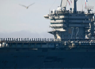 Burned-out US carrier sailors near Iran tried to jump overboard – Military Times
