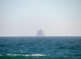 Iran says close to Hormuz plan with Oman, but reopening depends on US