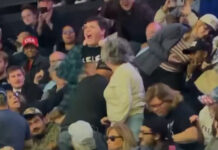 Numerous MAGA Men Beat Female Epstein Protestor into Silence to Chants of USA USA at Trump Rally